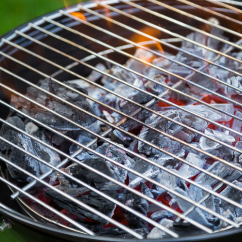 A close-up of a charcoal grill.